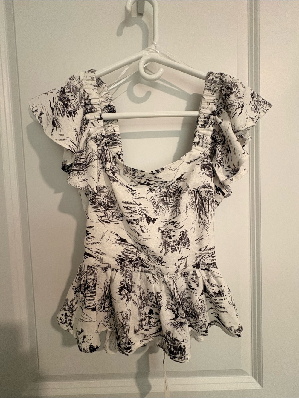 Francesca's Collections White Top with Black Toile Print and Ruffle Peplum